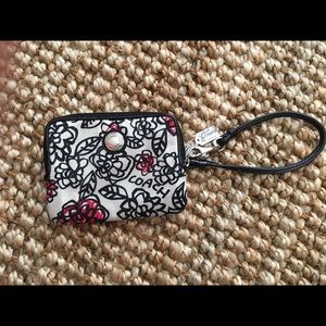 Small Coach floral wristlet